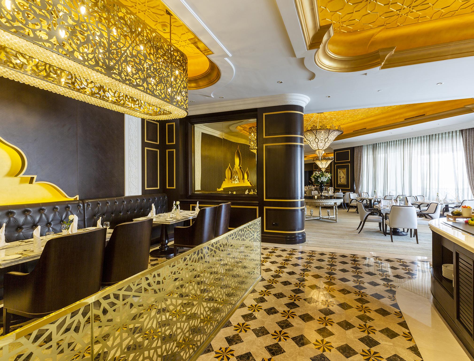 فندق إزدان بالاس الدوحة المظهر الخارجي الصورة The interior of the restaurant